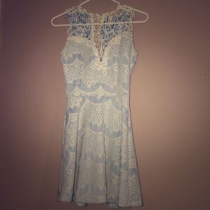 Lace neck pleated dress